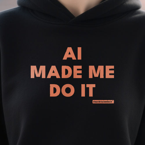 Ai Made Me Do It design shown close up on a black unisex hoodie