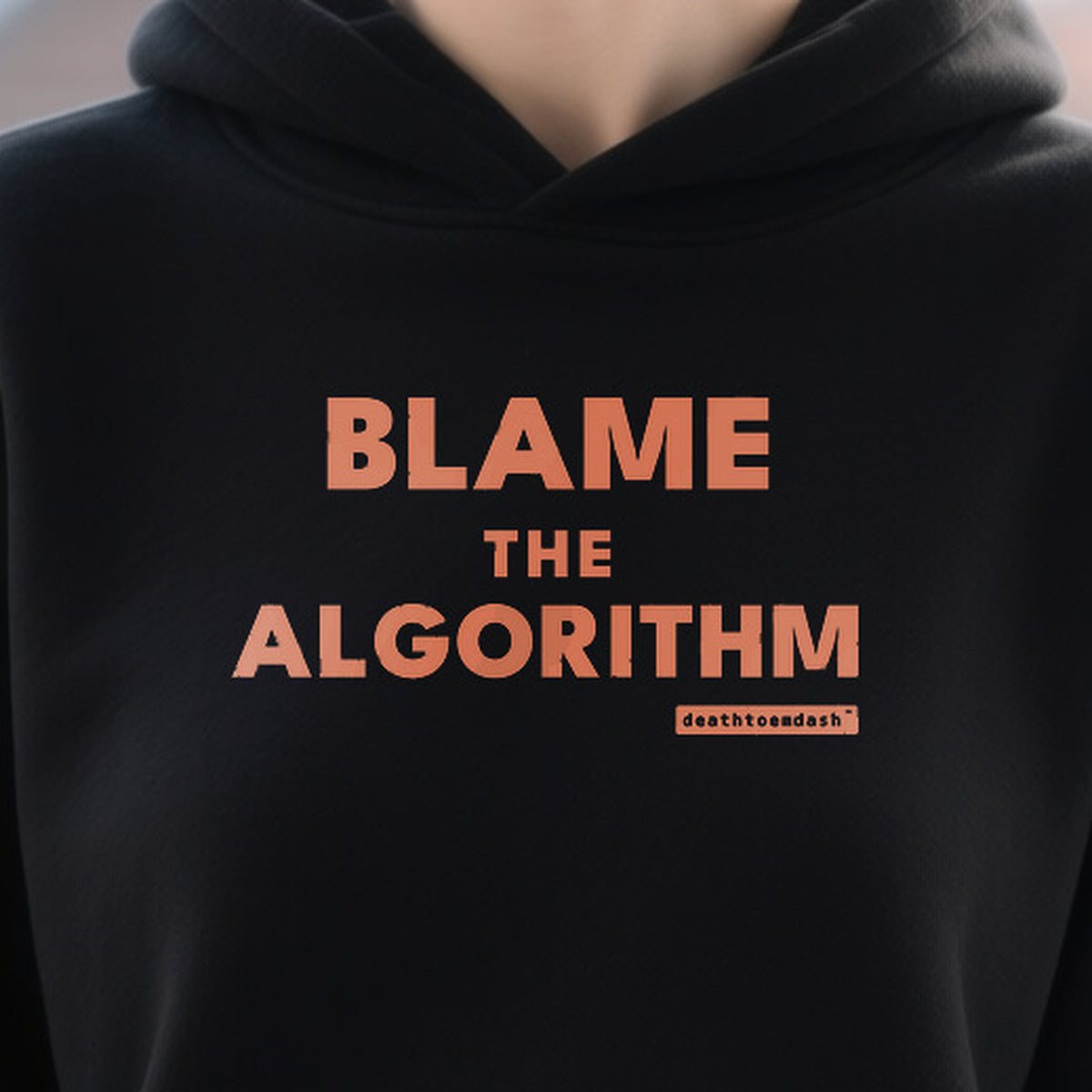 Blame The Algorithm design shown close up on a black unisex hoodie