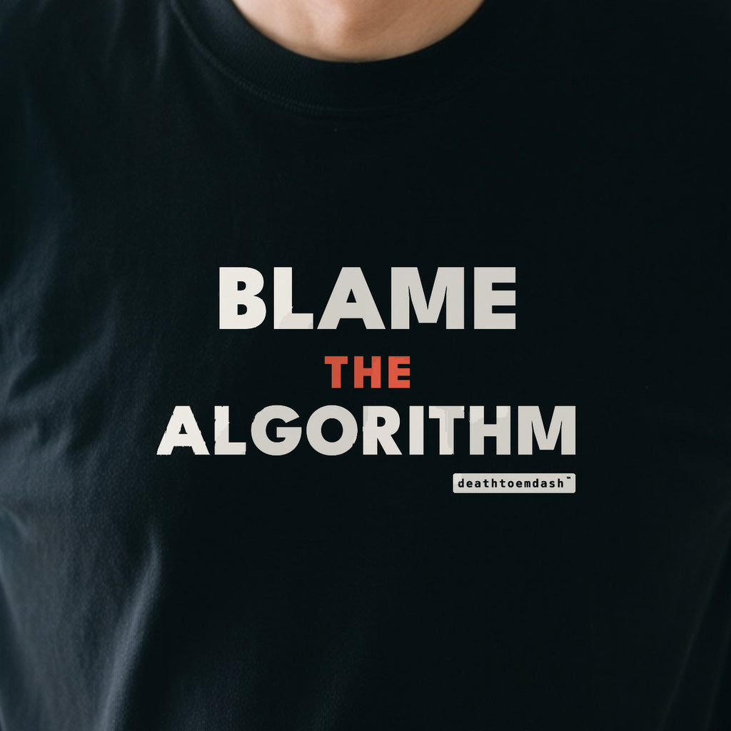 Blame The Algorithm design shown close up on a black unisex t-shirt
