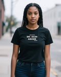 Certified Em-Dash Abuser women's relaxed t-shirt in black, worn