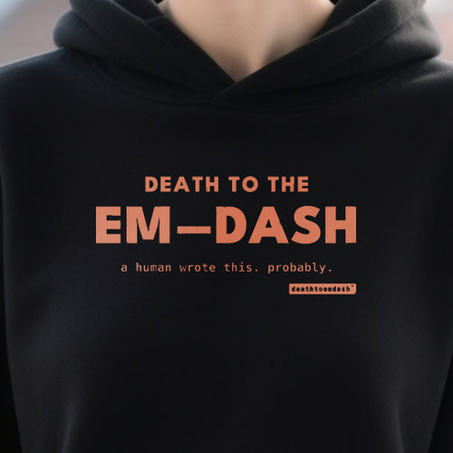 Death To The Em Dash design shown close up on a black unisex t-shirt