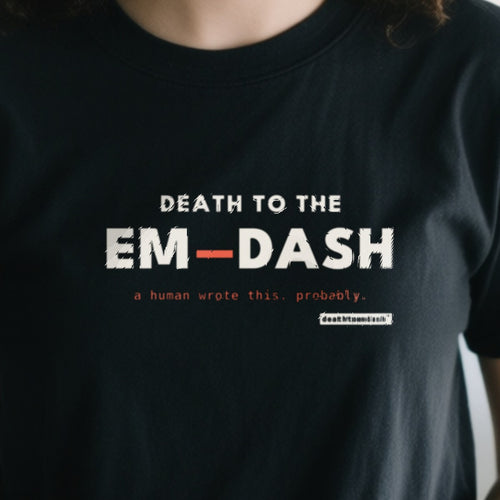 Death To The Em Dash design shown close up on a black unisex t-shirt