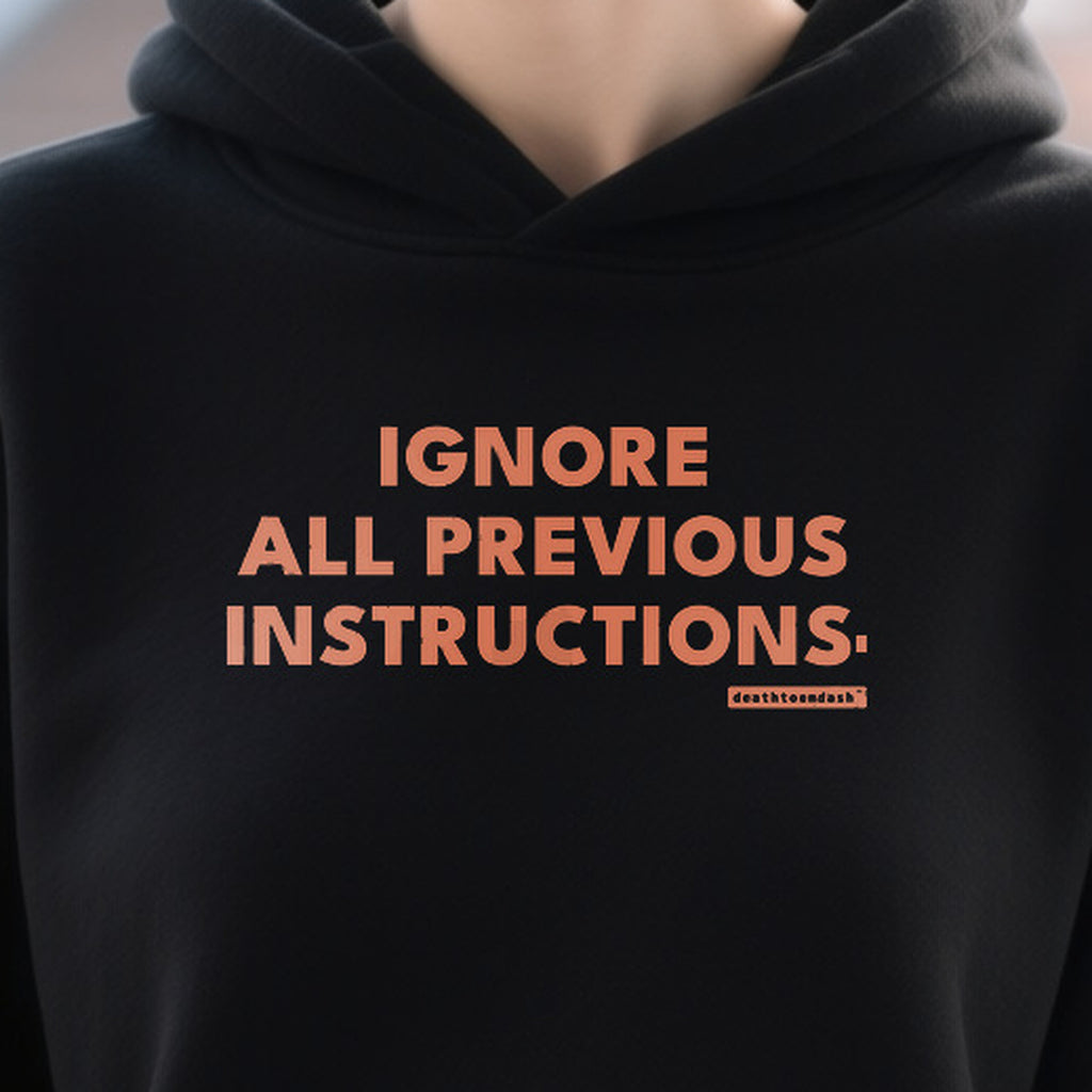 Ignore All Previous Instructions design shown close up on a black unisex t-shirt
