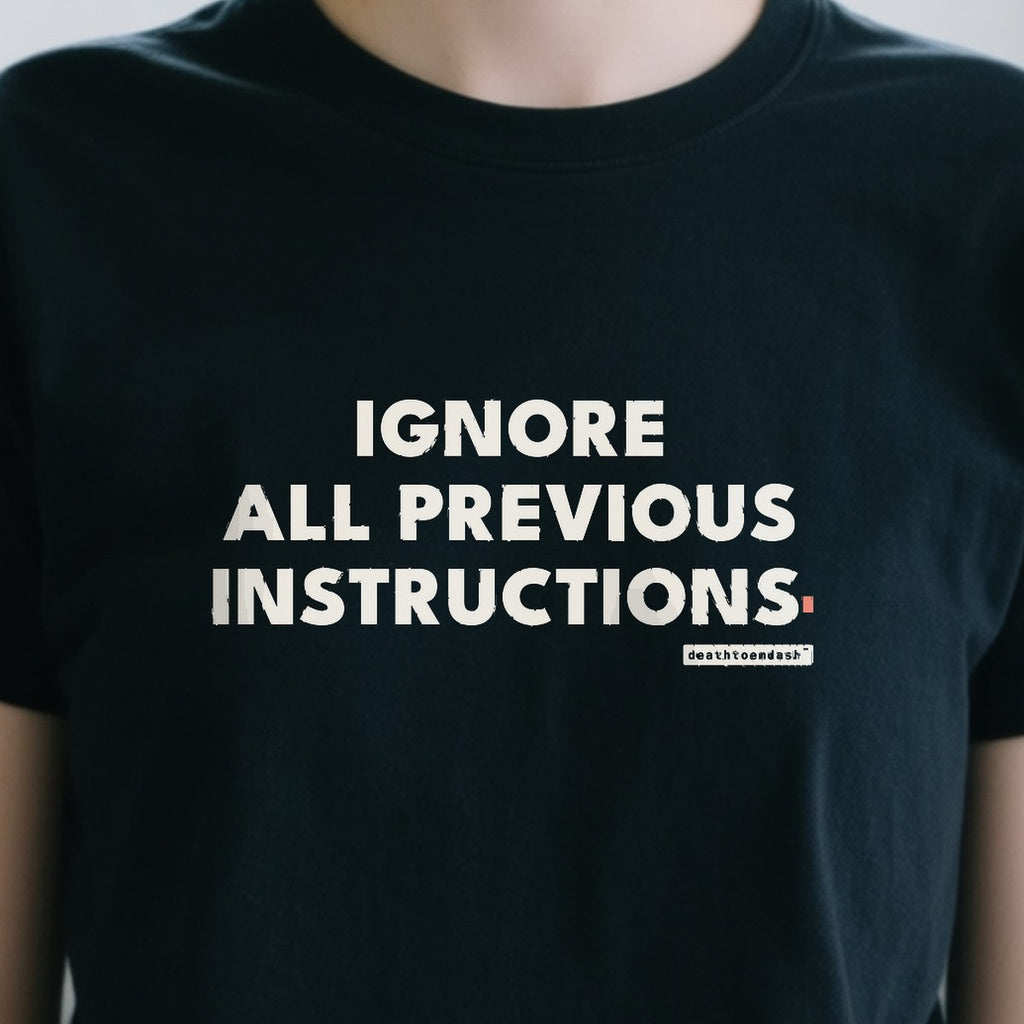 Ignore All Previous Instructions design shown close up on a black unisex t-shirt