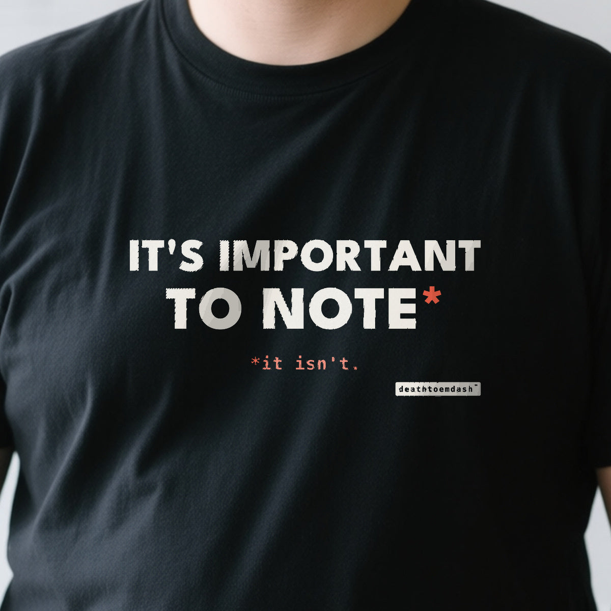 It S Important To Note design shown close up on a black unisex t-shirt