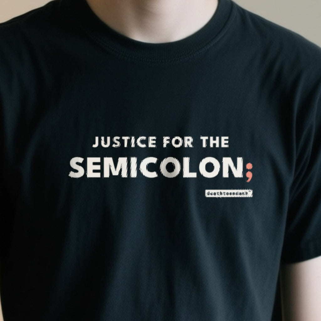 Justice For The Semicolon design shown close up on a black unisex t-shirt