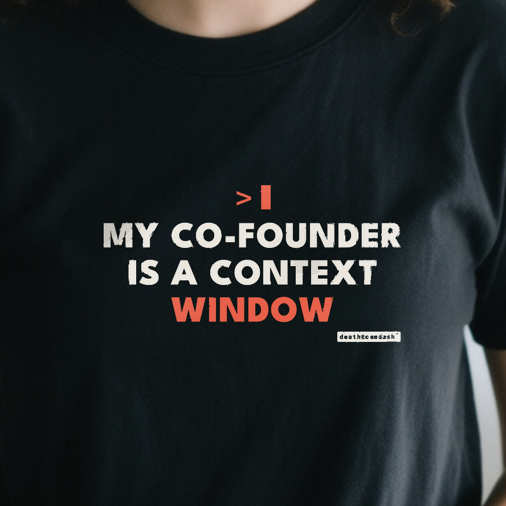 My Cofounder Is A Context Window design shown close up on a black unisex t-shirt