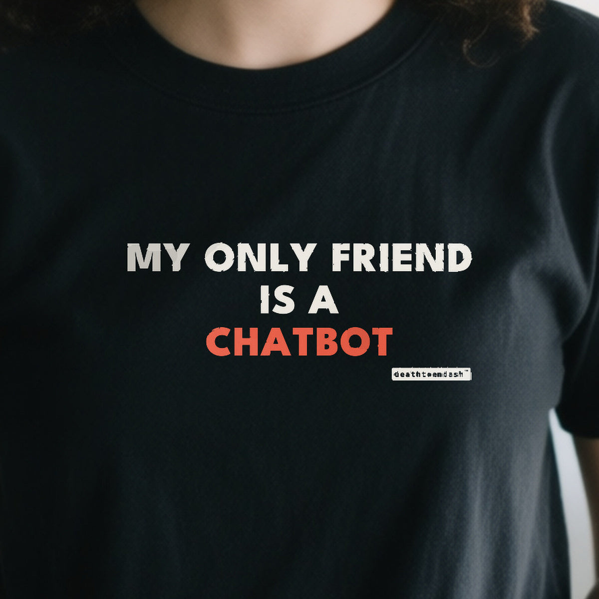 My Only Friend Is A Chatbot design shown close up on a black unisex t-shirt