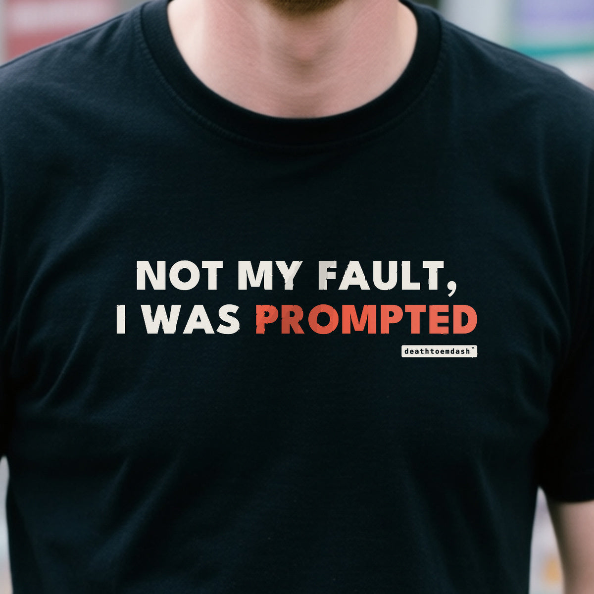 Not My Fault I Was Prompted design shown close up on a black unisex t-shirt