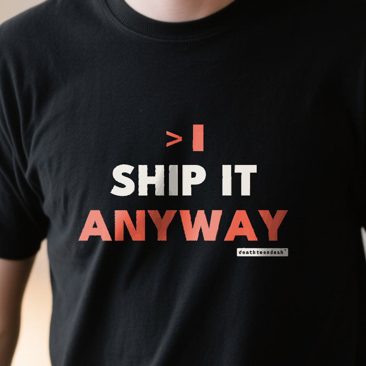Ship It Anyway design shown close up on a black unisex t-shirt