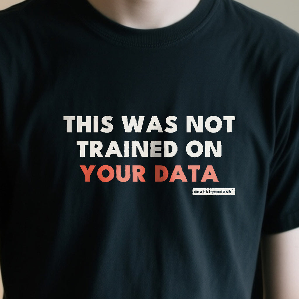 This Was Not Trained On Your Data design shown close up on a black unisex t-shirt