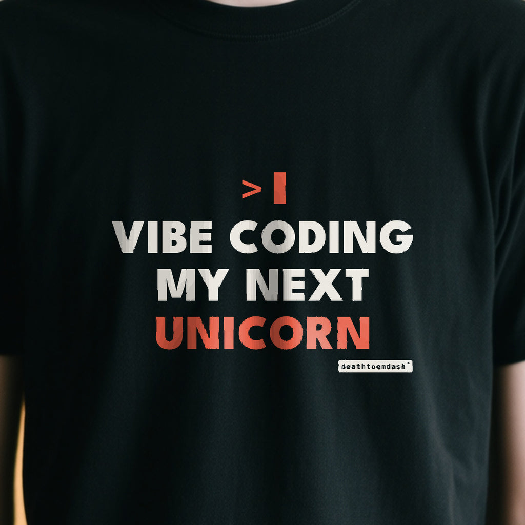 Vibe Coding My Next Unicorn design shown close up on a black unisex t-shirt