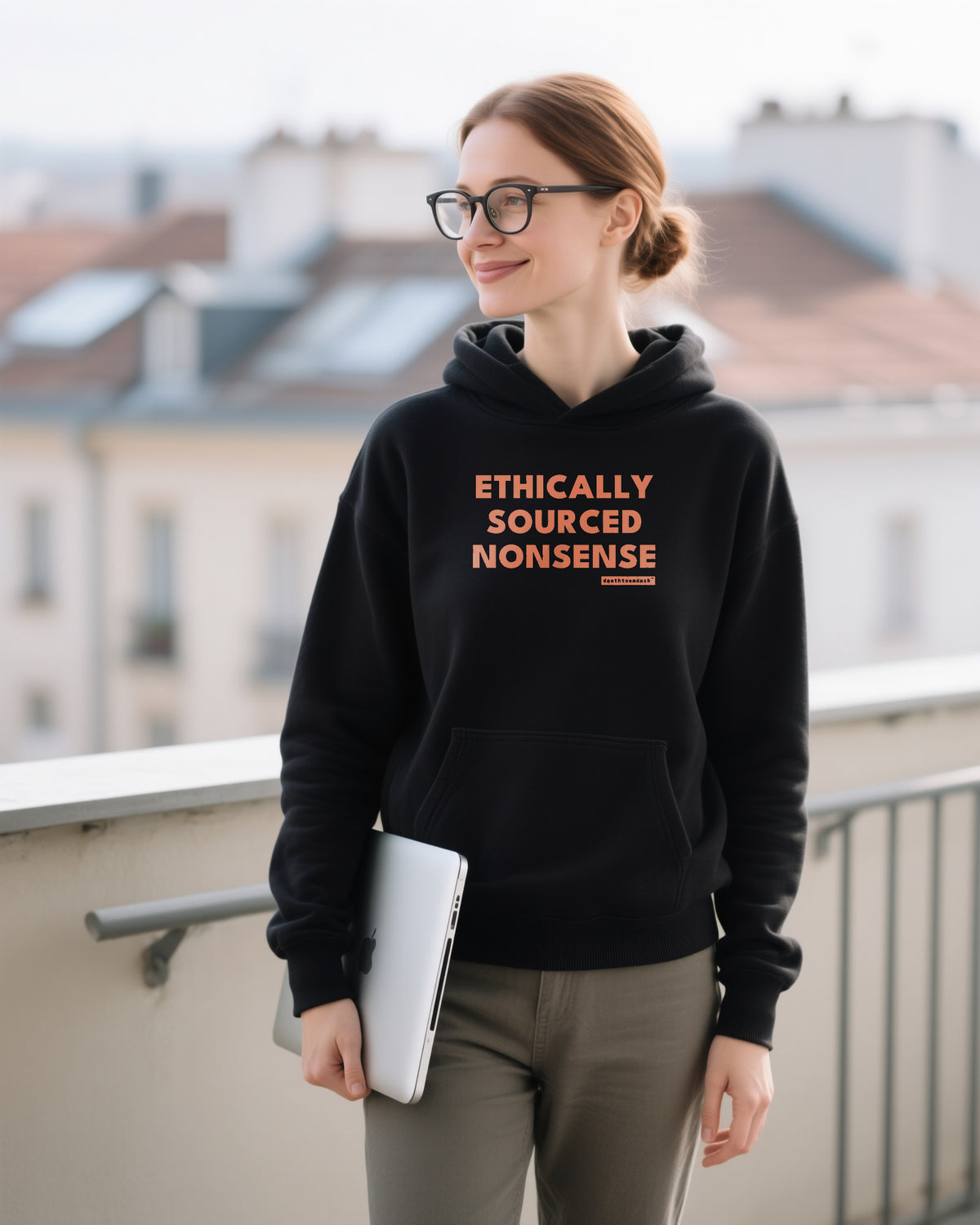 Ethically Sourced Nonsense unisex heavyweight hoodie in black, worn