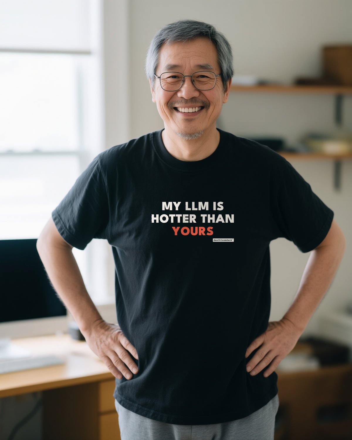 My Llm Is Hotter Than Yours unisex heavyweight t-shirt in black, worn