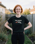 The Voices Have An Api Now unisex heavyweight t-shirt in black, worn