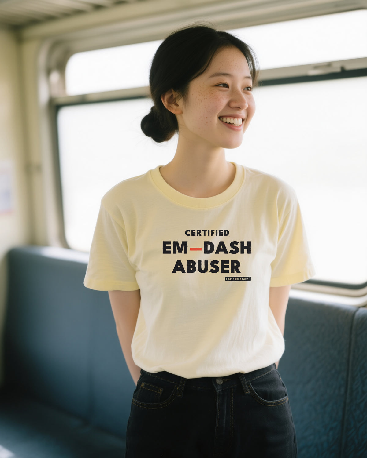 Certified Em Dash Abuser unisex heavyweight t-shirt in ivory, worn