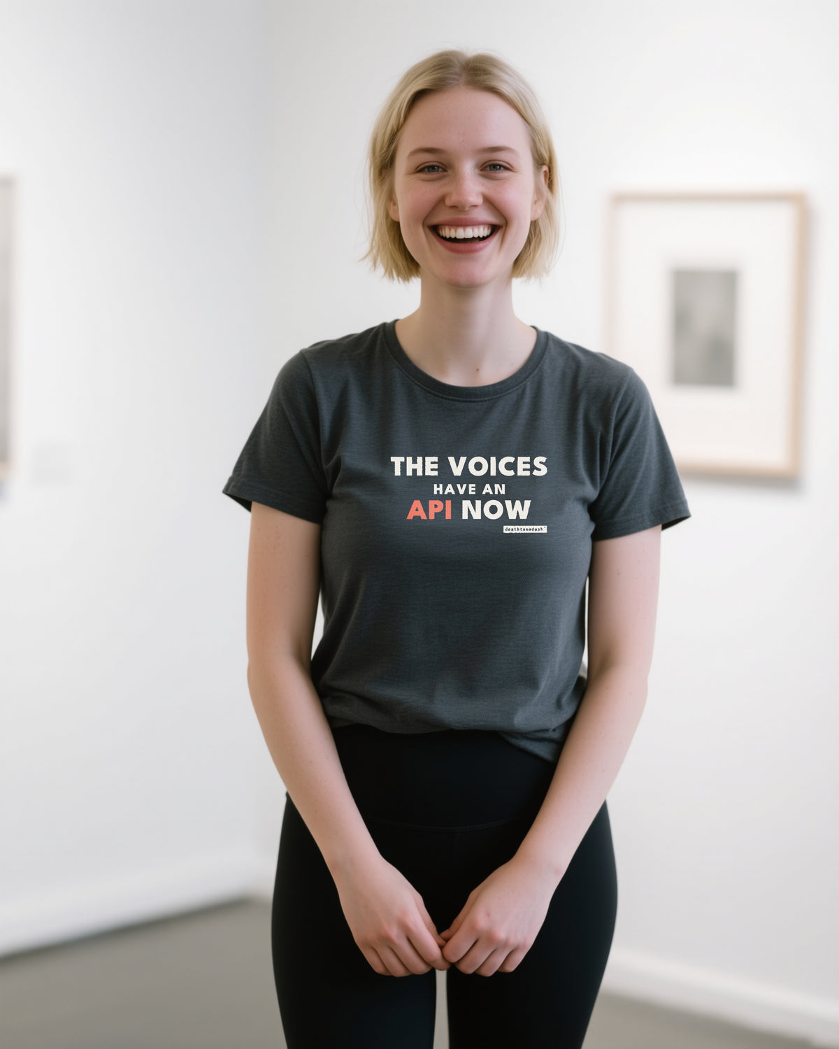The Voices Have An Api Now unisex heavyweight t-shirt in dark grey heather, worn