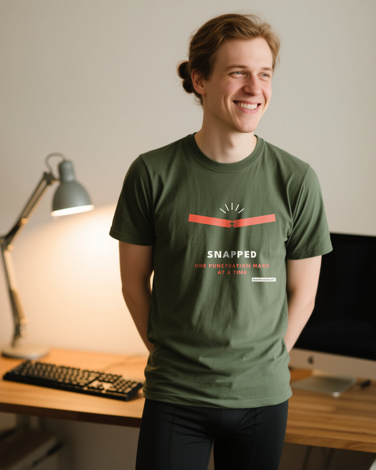 Snapped unisex heavyweight t-shirt in moss, worn