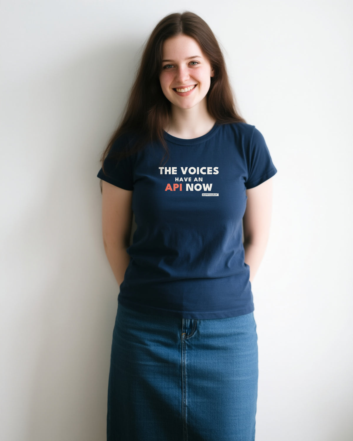The Voices Have An Api Now unisex heavyweight t-shirt in navy, worn