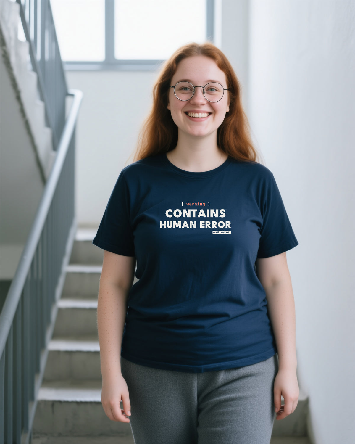 Warning Contains Human Error unisex heavyweight t-shirt in navy, worn