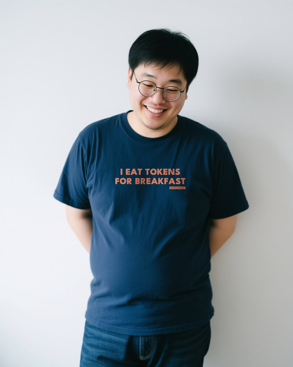 I Eat Tokens For Breakfast unisex heavyweight t-shirt in true navy, worn
