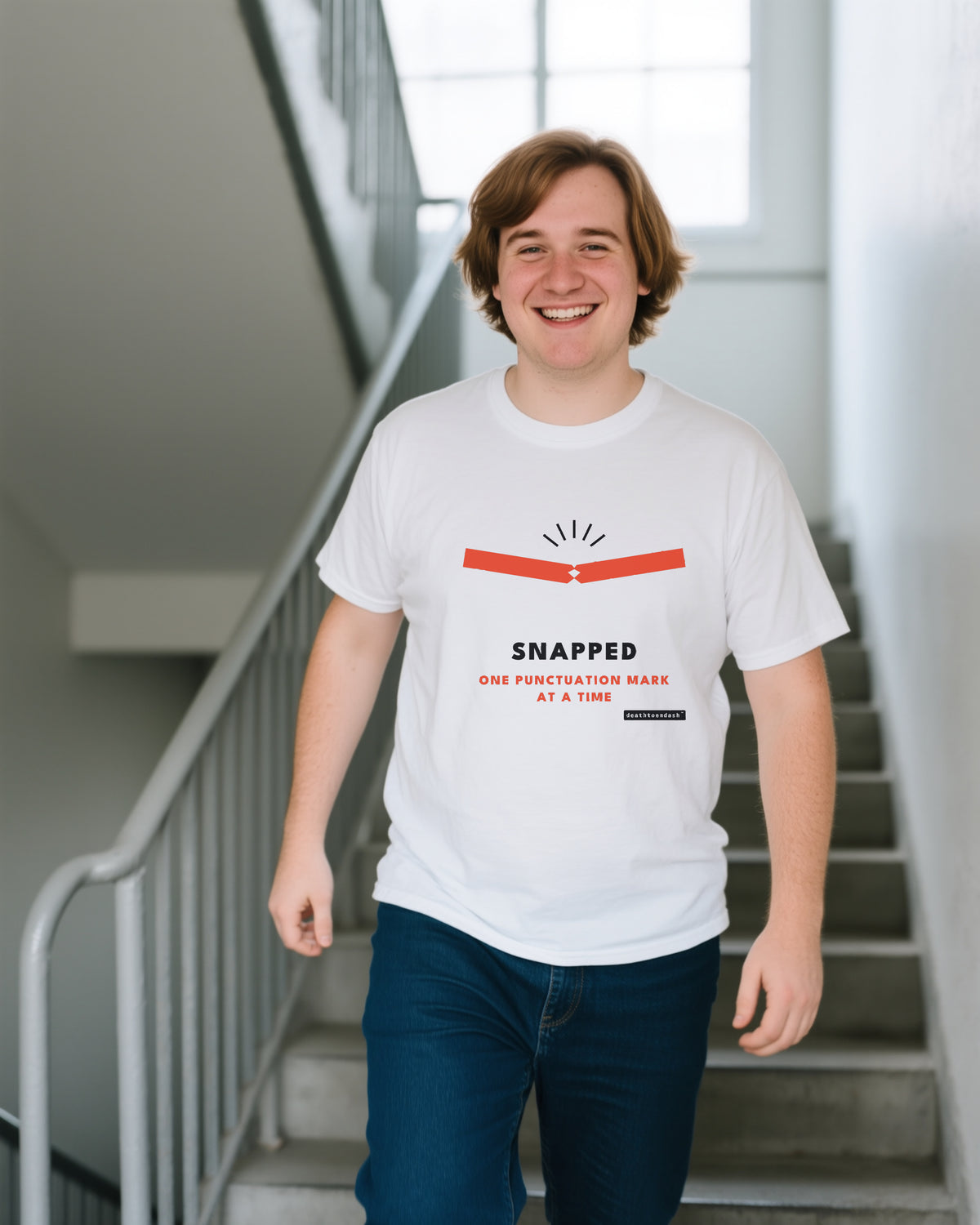 Snapped unisex heavyweight t-shirt in white, worn