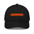 Black cap with the coral em-dash bar embroidered on the front
