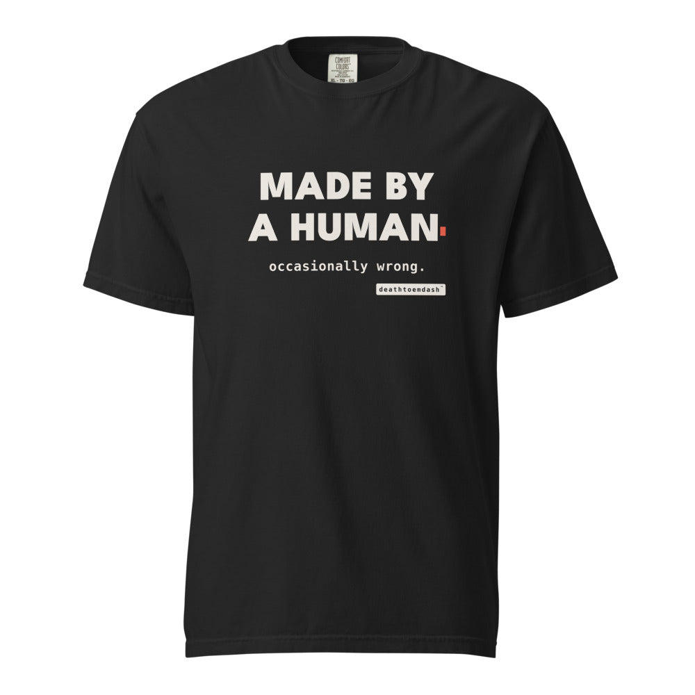 made by a human occasionally wrong tee, shown flat so the design reads