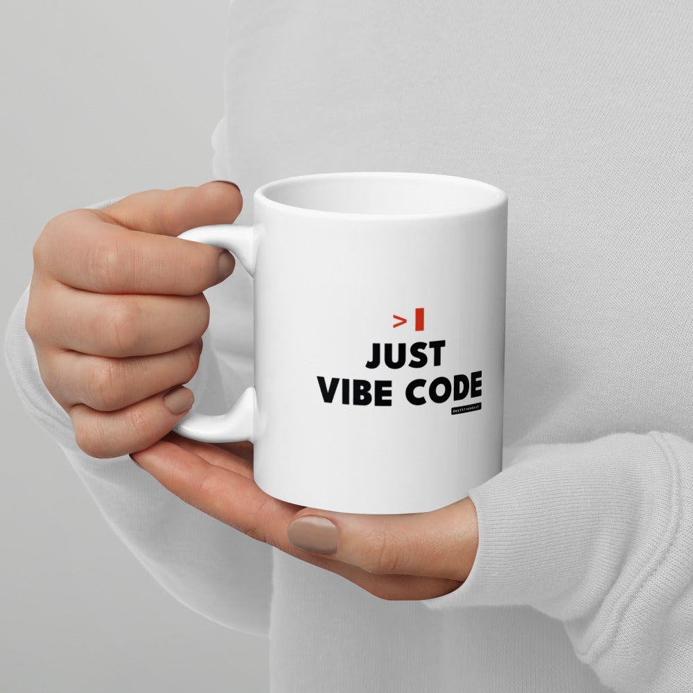 Just Vibe Code mug, close up, handle on the left